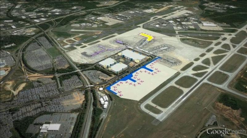 Google Earth image of a sky view of the Concourse C Expansion, the mapped out area will show where the expansion will take place, the entire airfield can be viewed surrounded by other land in the area of the airport