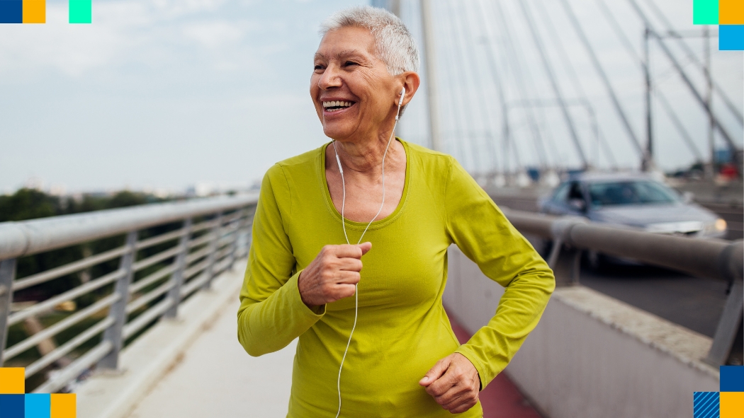 a photo of an older woman walking on a bridge enjoying her life and vitality