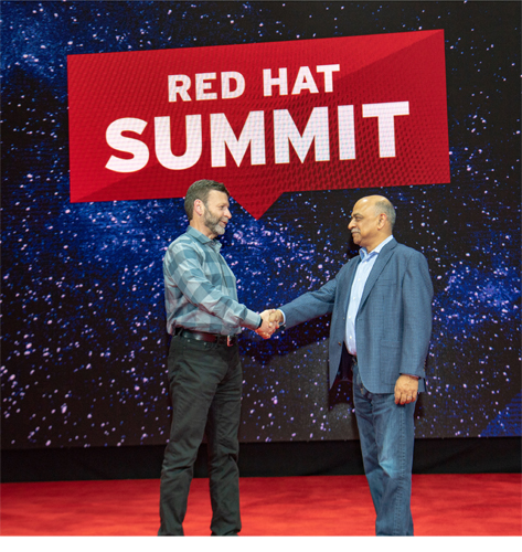 Paul Cormier, Executive Vice President, and President Products and Technologies, Red Hat, and Arvind Krishna, Senior Vice President, IBM Hybrid Cloud, at Red Hat Summit 2018 in San Francisco on May 7, 2018. (Credit: Red Hat)