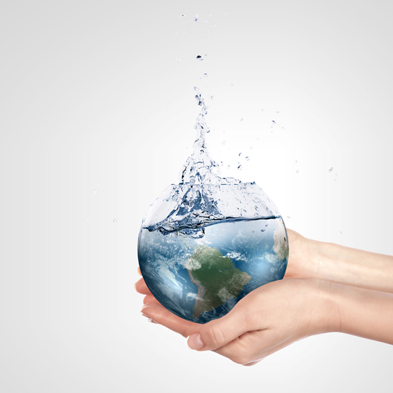 Hands holding the earth turning into water