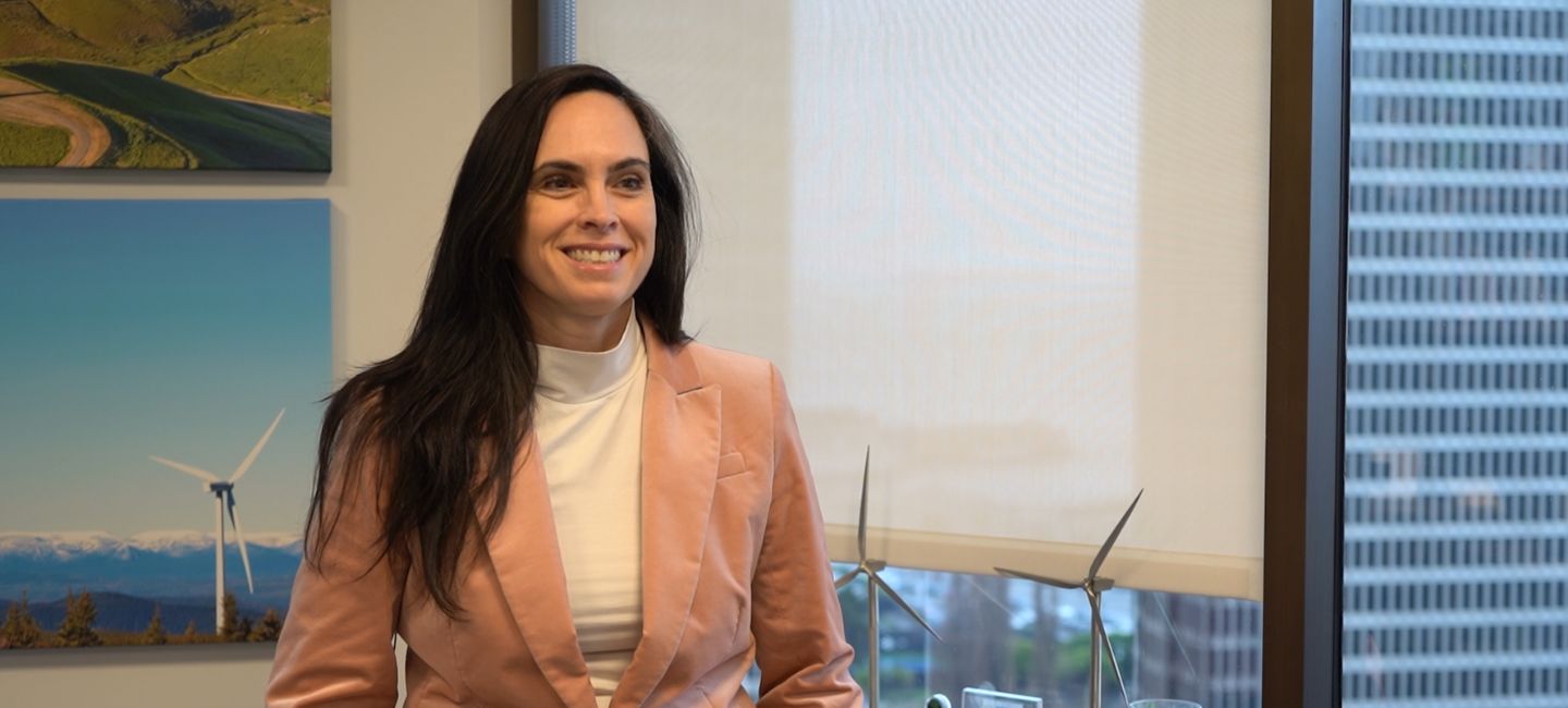 Woman in blazer in office 