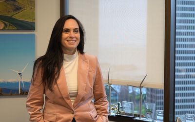 Woman in blazer in office 